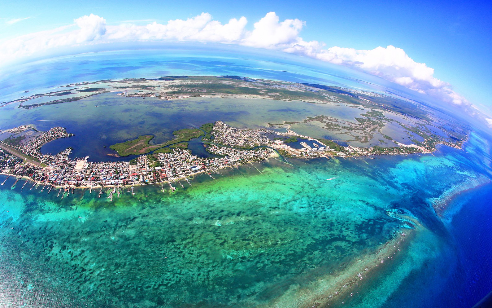 Aerial View of San Pedro town, Ambergris Caye, Belize with Barrier Reef